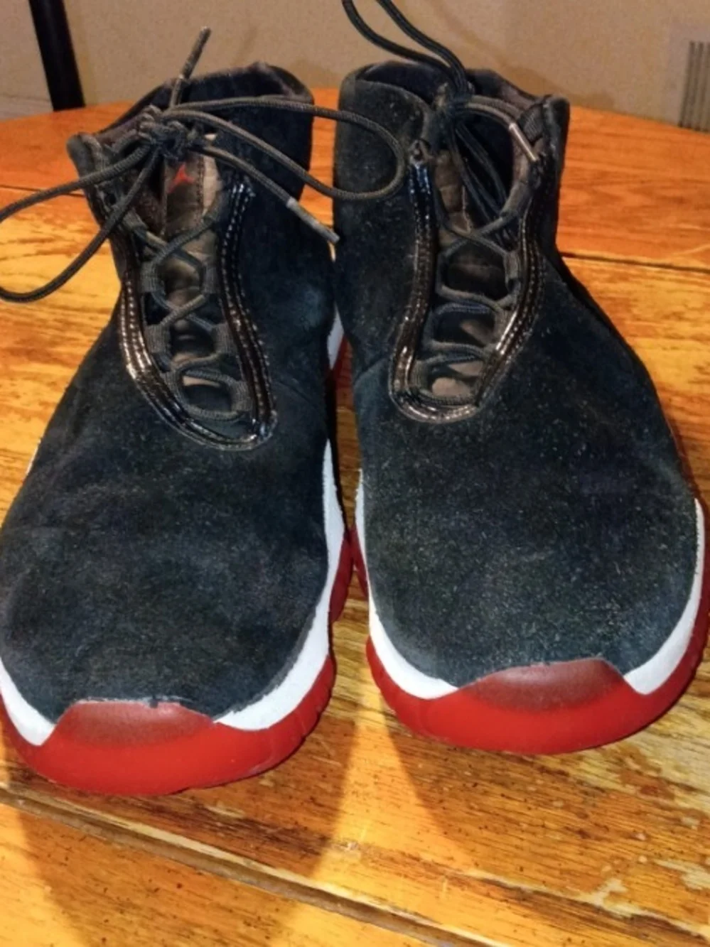 Air Jordan Black Suede Low-Top Sneakers with Red Sole